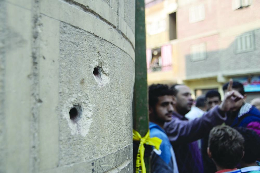 






طلقتان استقرتا في أحد الأعمدة الإسمنتية                             (د ب أ)