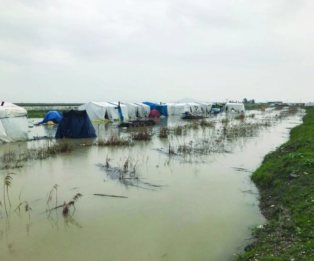 






آثار السيول على مخيمات السوريين في إدلب                                                                                                                                                                             (تويتر)