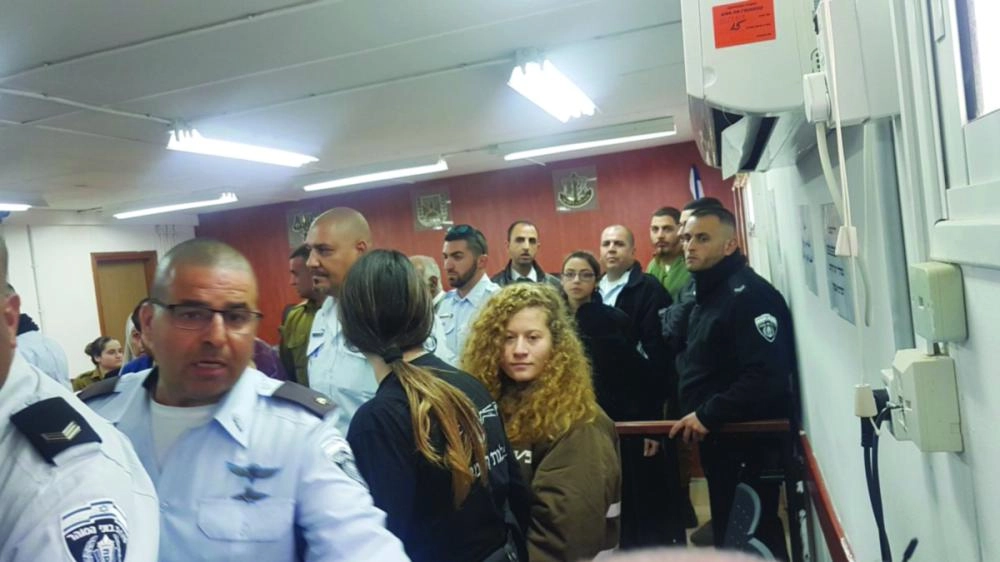 






عهد التميمي خلال محاكمتها