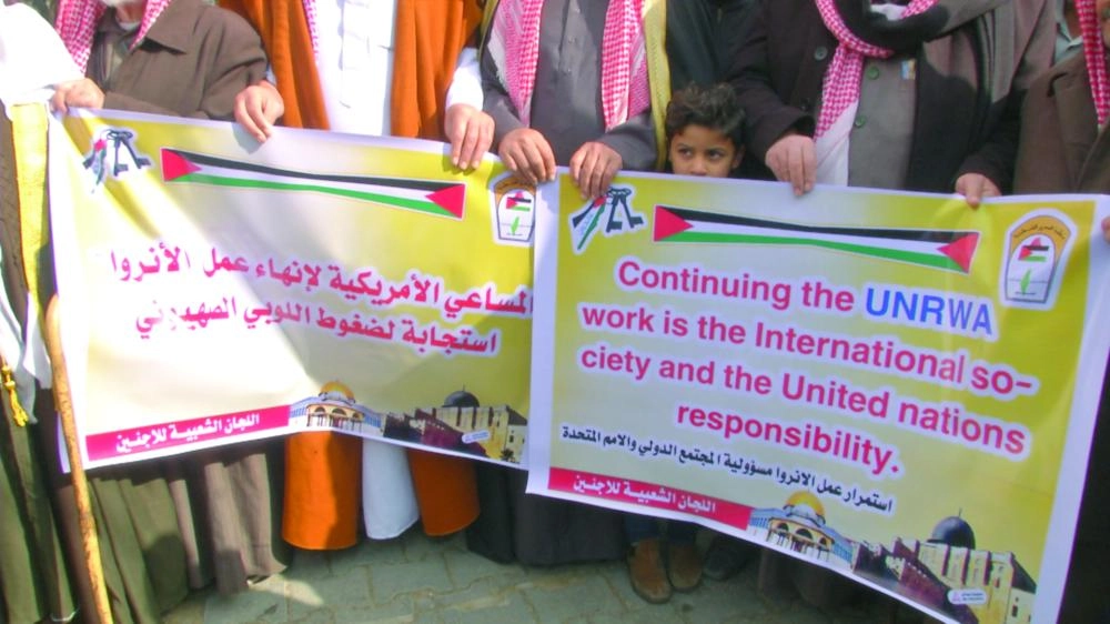 






وقفة احتجاجية في غزة ضد تقليص المساعدات                                              (تويتر)