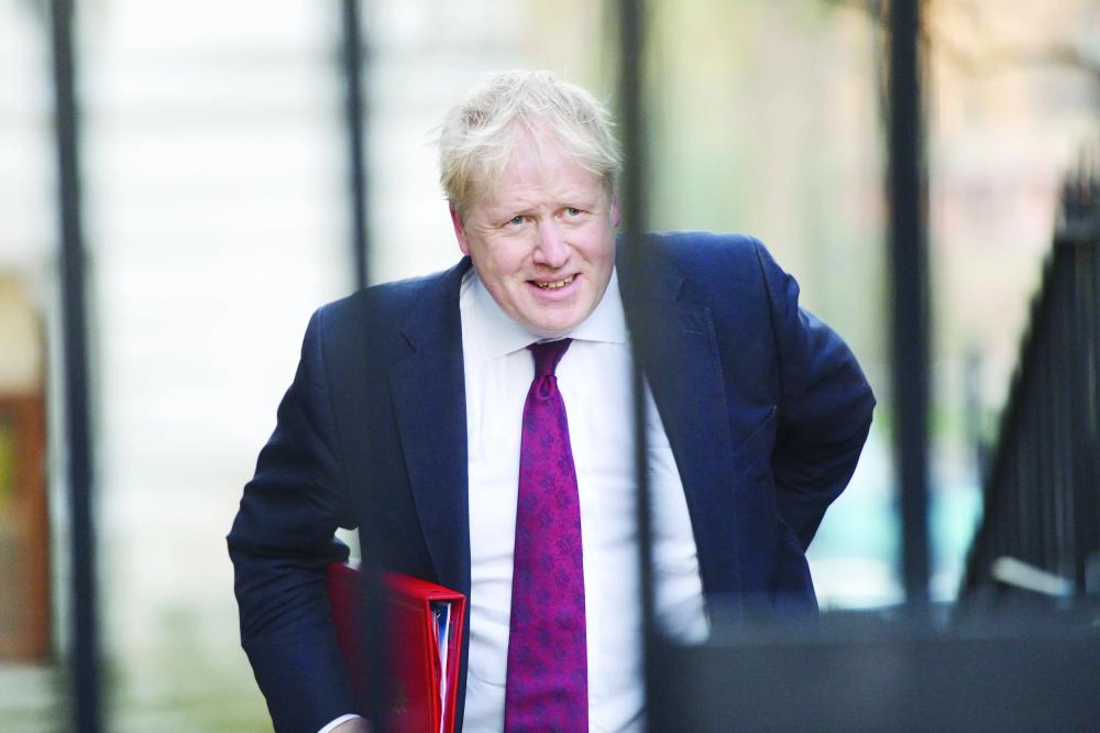 






جونسون لدى وصوله مقر الحكومة في لندن    (د ب أ)