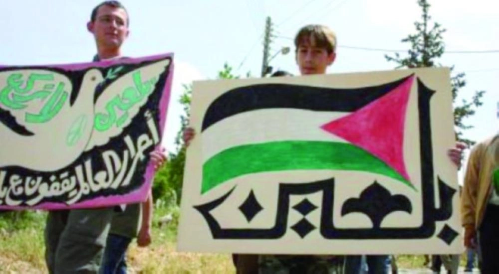 وفد من الحزب يزور بلعين الفلسطينية (تويتر)