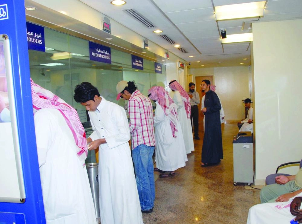 






متعاملون في أحد فروع الراجحي                                            (مكة)