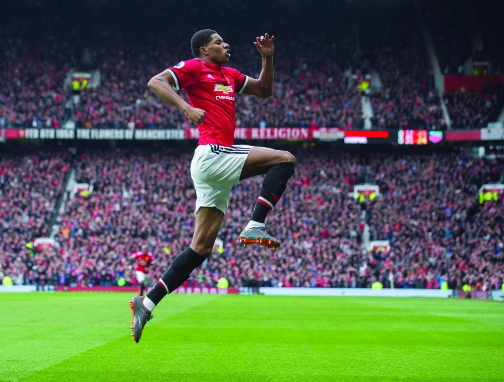   ماركوس راشفورد يحتفل بهدفه الأول في ليفربول أمس (إ ب أ)