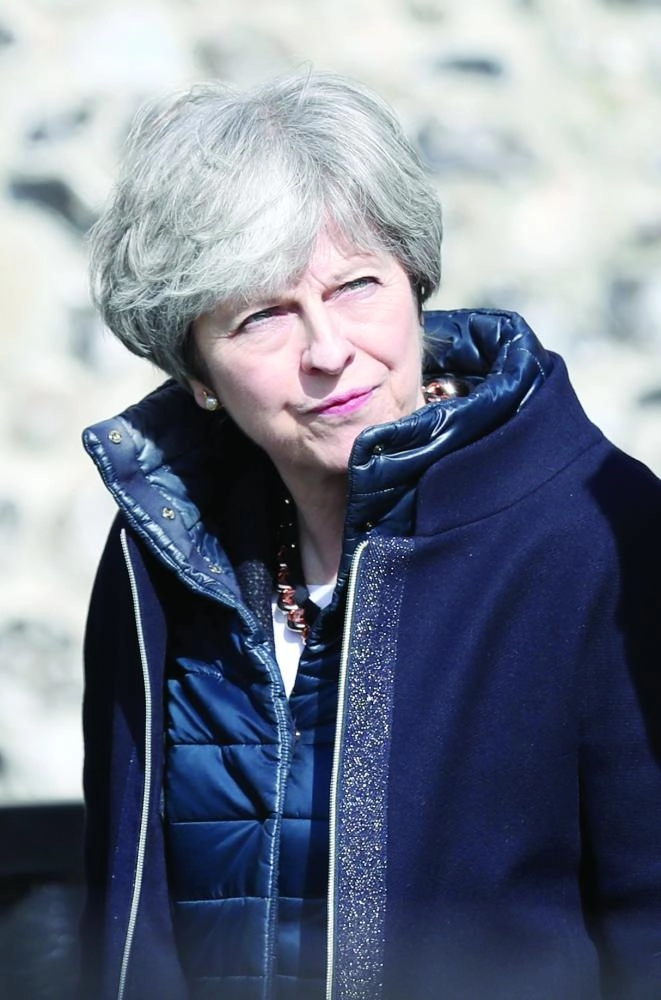 dpatop - UK Prime Minister Theresa May visits the area of the suspected nerve agent attack on Russian double agent Sergei Skripal and his daughter Yulia in Salisbury, England, 15 March 2018. Photo: Andrew Matthews/PA Wire/dpa