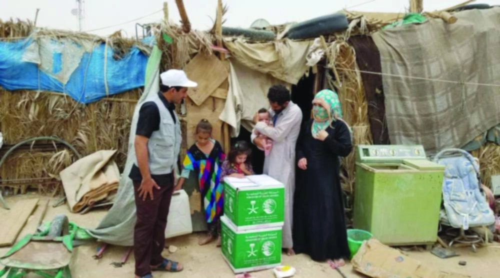 






مستفيدون من الجوف يتسلمون مساعدات المركز                                (واس)