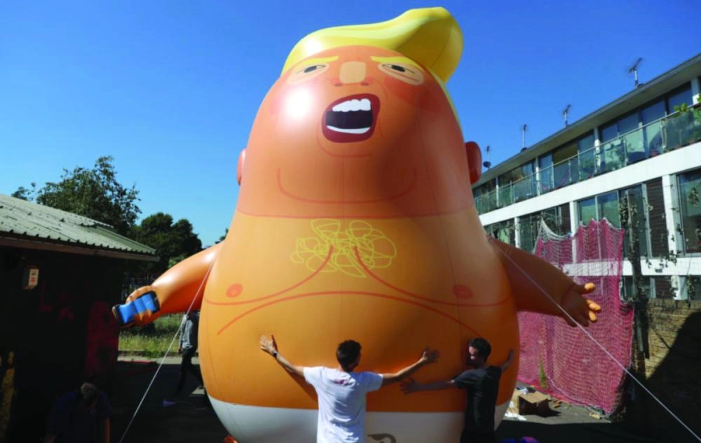 






بالون الرئيس الأمريكي احتجاجا على الزيارة                                (تويتر)