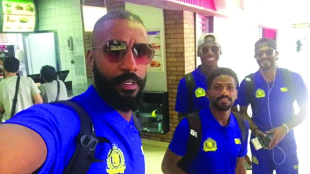 






وليد عبدالله وزملاؤه قبل المغادرة                                          (تويتر)