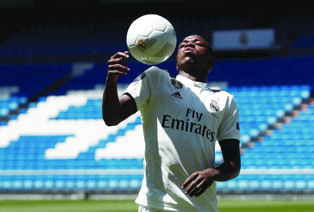 epa06900235 Real Madrid's Brazilian new forward Vinicius Junior during his presentation at Santiago Bernabeu stadium in Madrid, Spain, 20 July 2018.  EPA/Mariscal