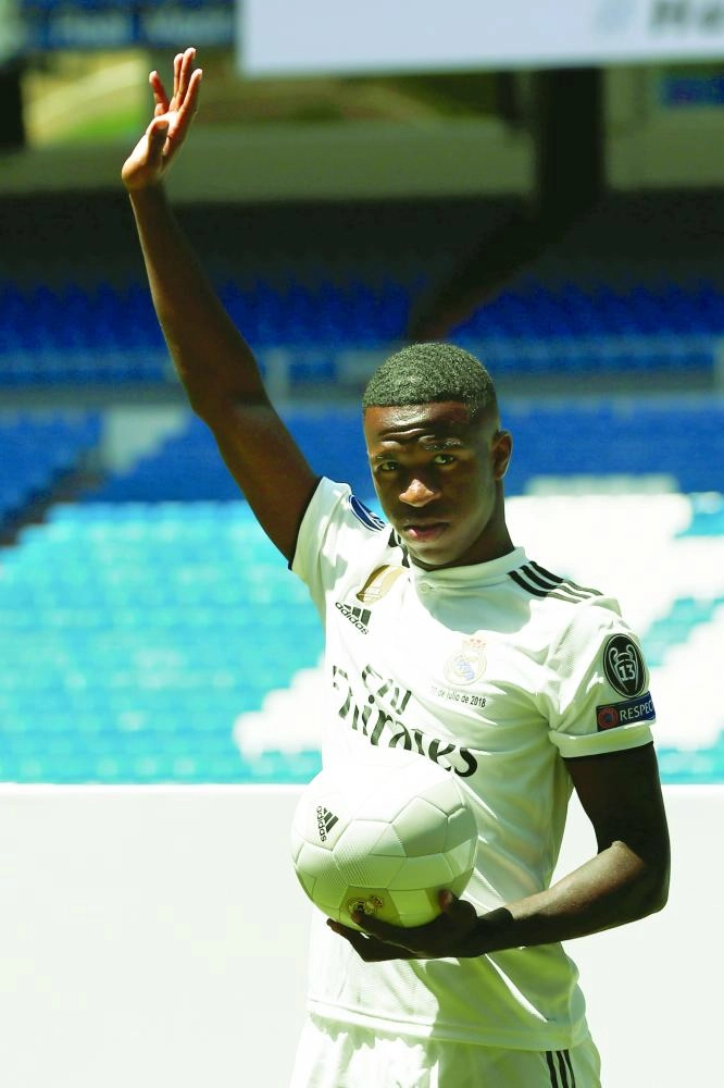 epa06900233 Real Madrid's Brazilian new forward Vinicius Junior during his presentation at Santiago Bernabeu stadium in Madrid, Spain, 20 July 2018.  EPA/Mariscal