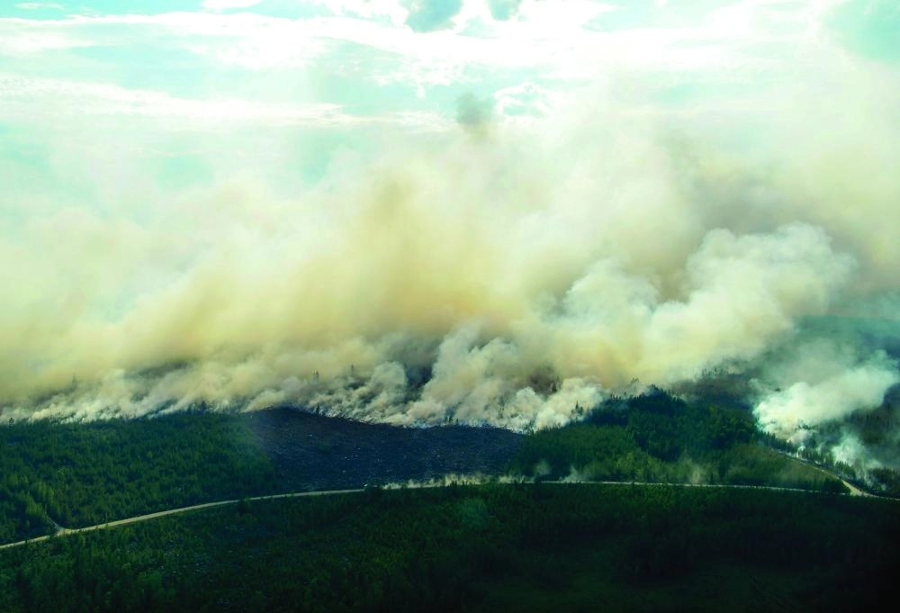 من حرائق الغابات السويدية (إ ب أ)