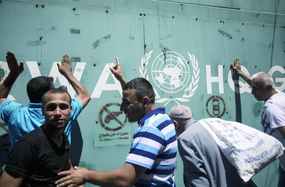 UNRWA employees protest against job cuts in Gaza City