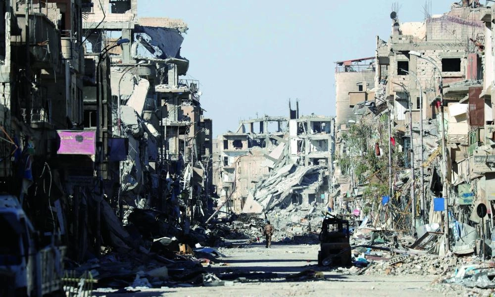 من أثار تدمير لمباني وأحياء من قوات النظام في وقت سابق(مكة)