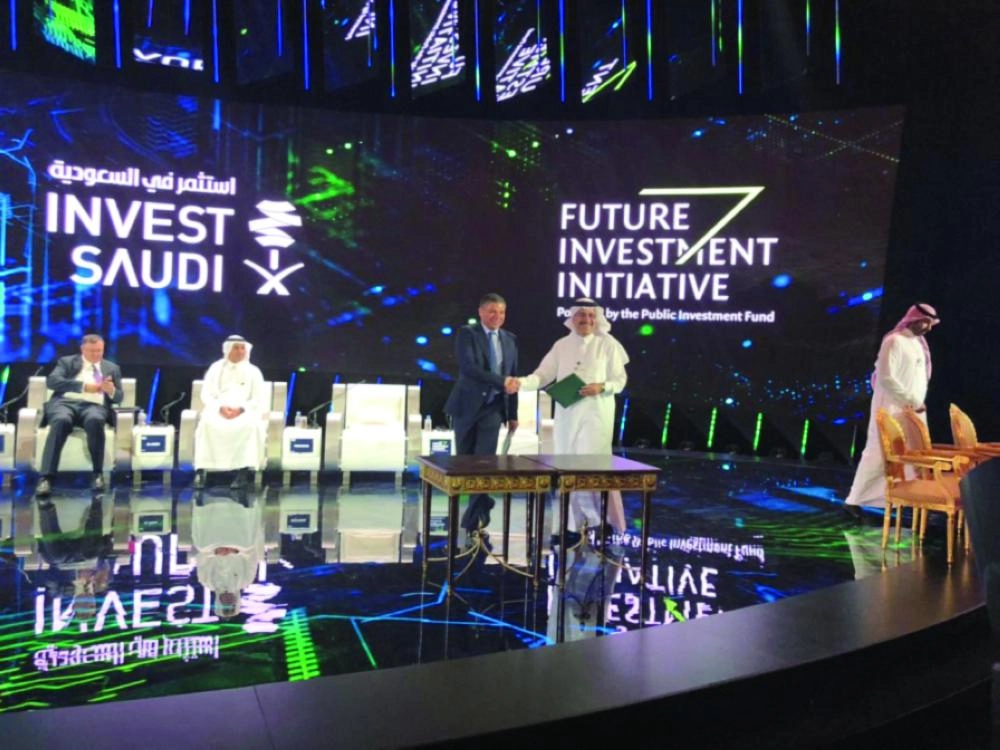 أثناء توقيع مذكرات التفاهم (أرامكو السعودية)