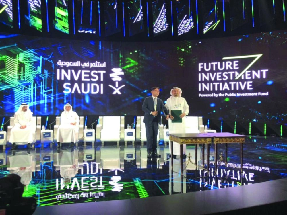 أثناء توقيع مذكرات التفاهم (أرامكو السعودية)