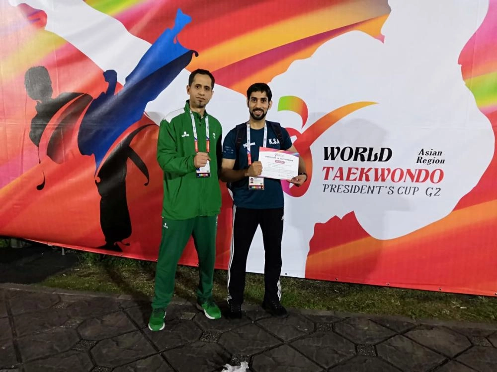 العباس مع مدربه أبوالرحى (مكة)