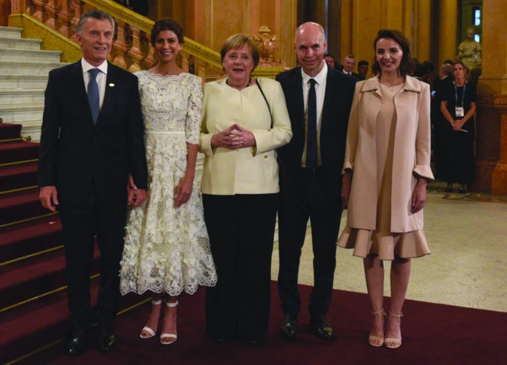 






الرئيس الأرجنتيني أثناء استقبال ميركل                                          (د ب أ)