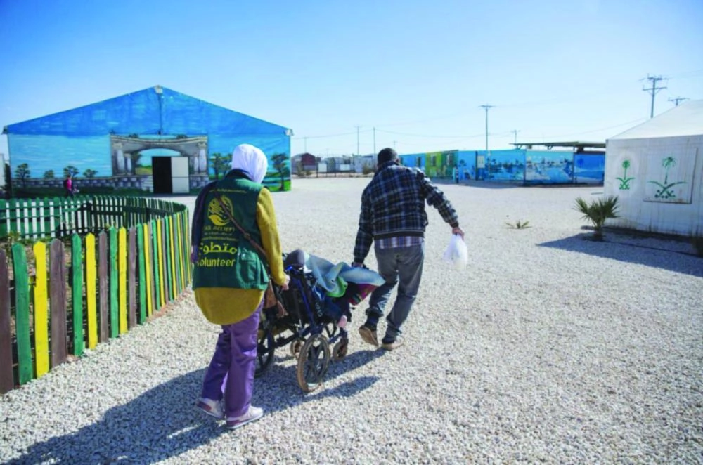 






مساعدات للاجئين السوريين في مخيم الزعتري   (واس)