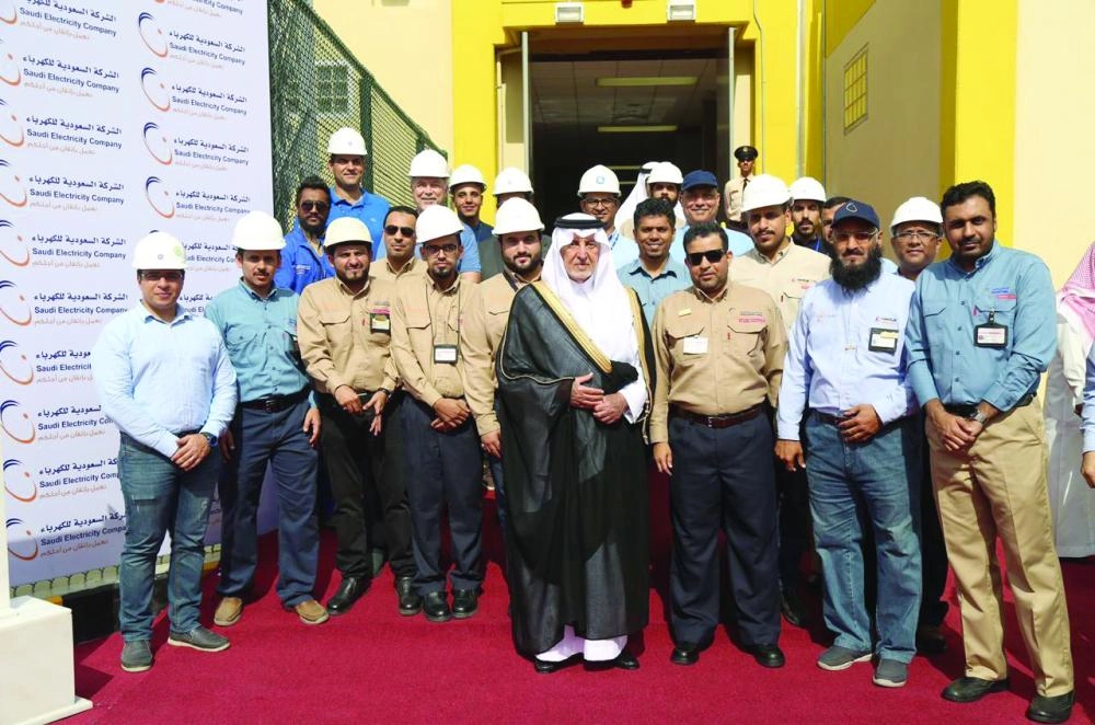 ومع العاملين في مخططات ولي العهد عقب الافتتاح (مكة)