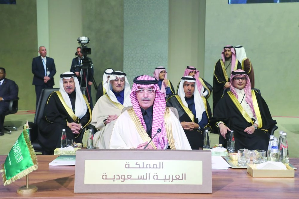 



الجدعان خلال مشاركته في القمة         (د ب أ)