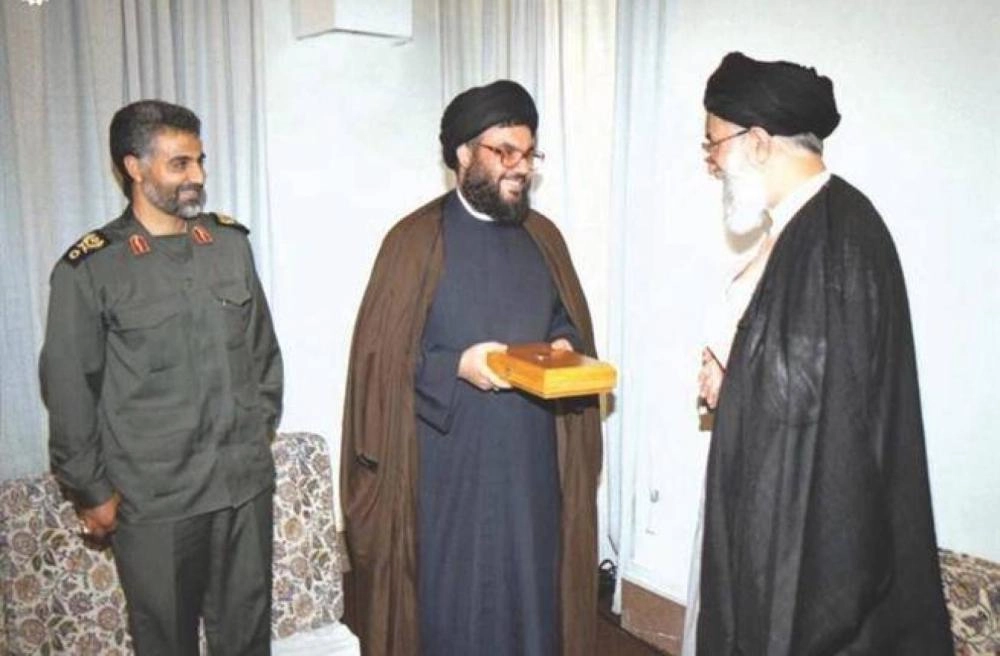 hasan-nasr-alaah-qasim-slimani-t_622241_highres