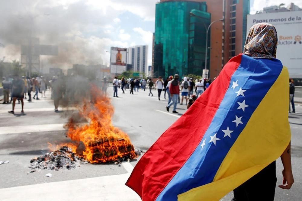 جانب من الاحتجاجات التي تشهدها فنزويلا