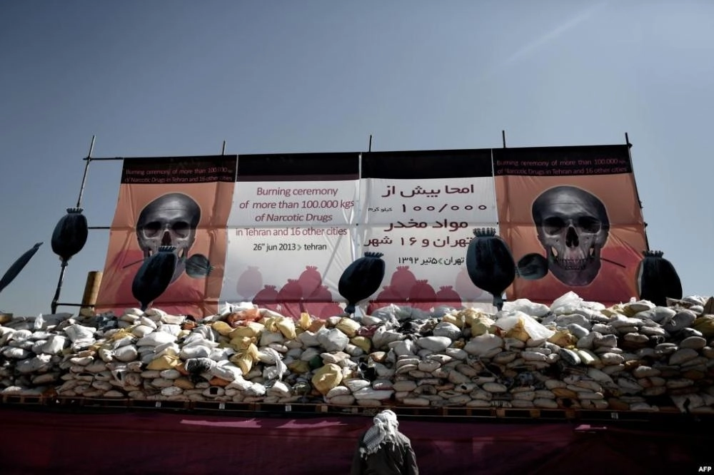 حرق المخدرات بإيران (RFE-RL)