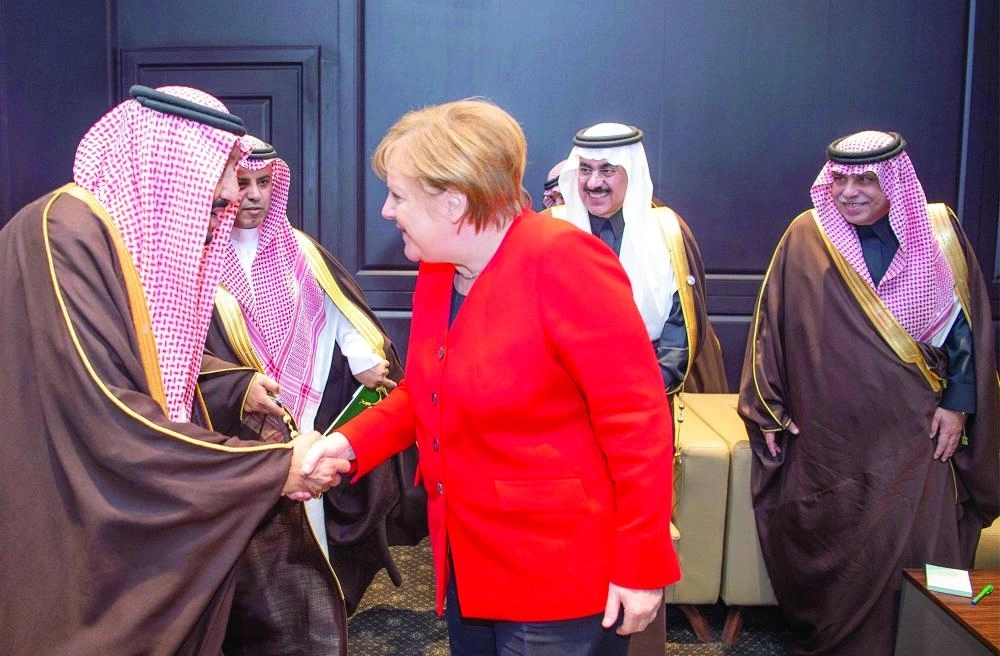 






.. ولدى لقائه أنجيلا ميركل