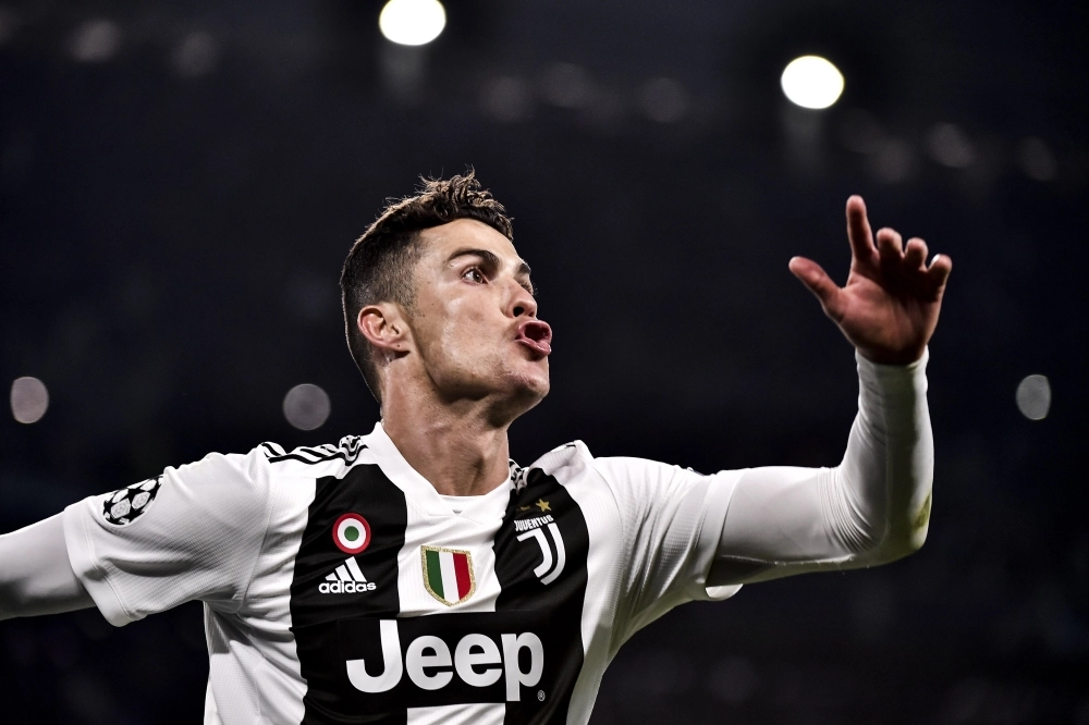 dpatop - 12 March 2019, Italy, Turin: Juventus' Cristiano Ronaldo celebrates scoring during the UEFA Champions League round of 16 second leg soccer match between Juventus and Atletico Madrid at the Allianz stadium. Photo: Marco Alpozzi/Lapresse via ZUMA Press/dpa