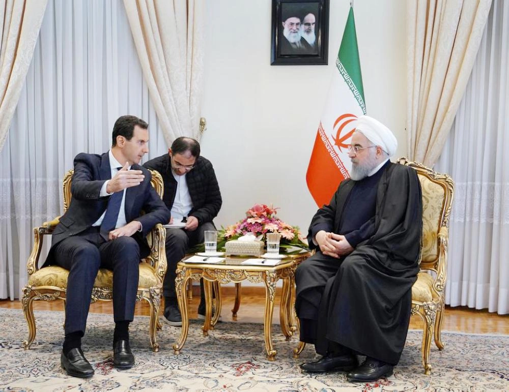 






لقاء روحاني والأسد الأخير في طهران                 (رويترز)