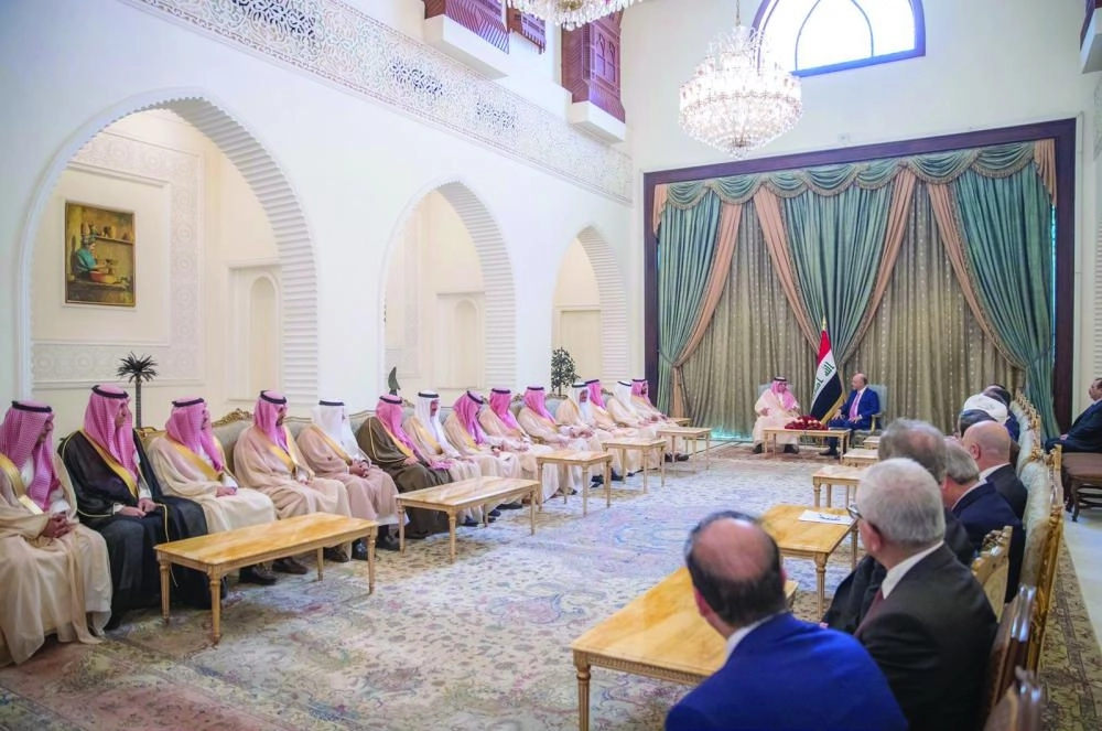 برهم صالح لدى استقباله ماجد القصبي في بغداد أمس (واس) 