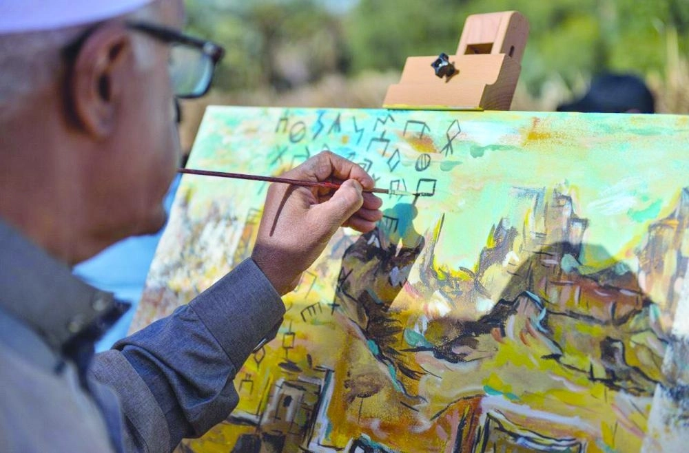 أحد الفنانين في فعالية سابقة (مكة)