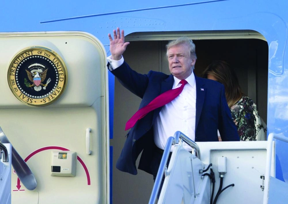 ترمب لدى وصوله مطار بالم بيتش الدولي (د ب أ)