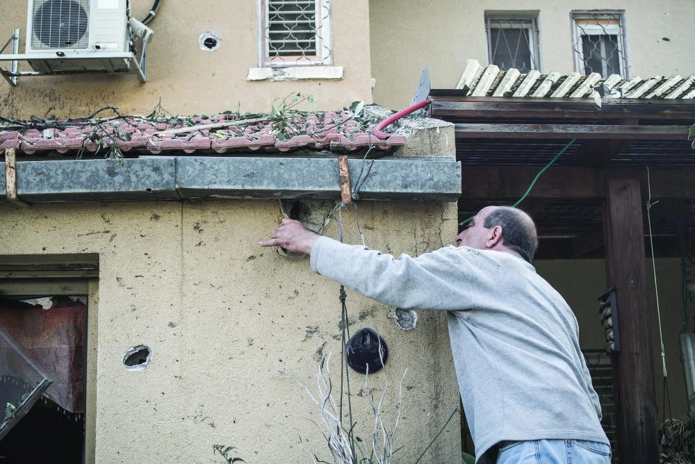 



بيت فلسطيني هدمته صواريخ إسرائيل