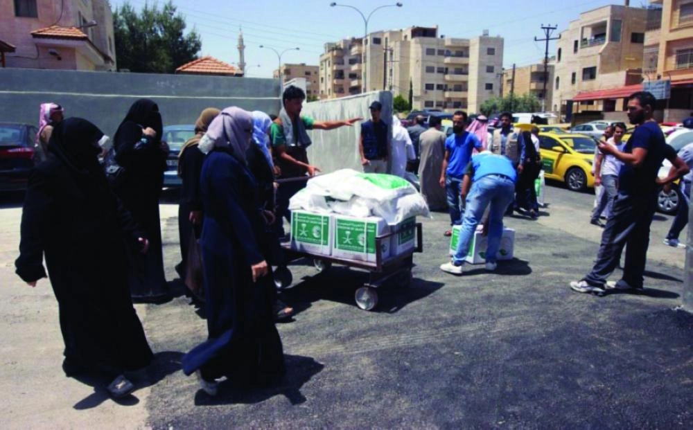 






توزيع السلال الرمضانية في مخيم اللاجئين بالأردن