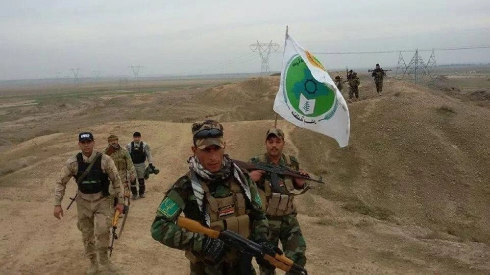 






مسلحون من حركة بدر العراقية