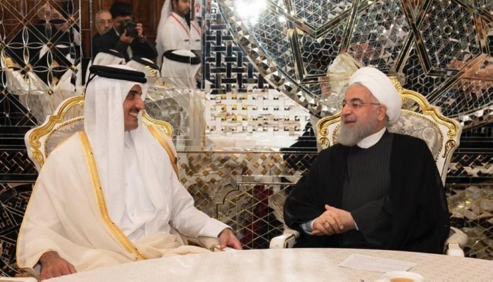 






لقاء سابق بين روحاني وتميم 