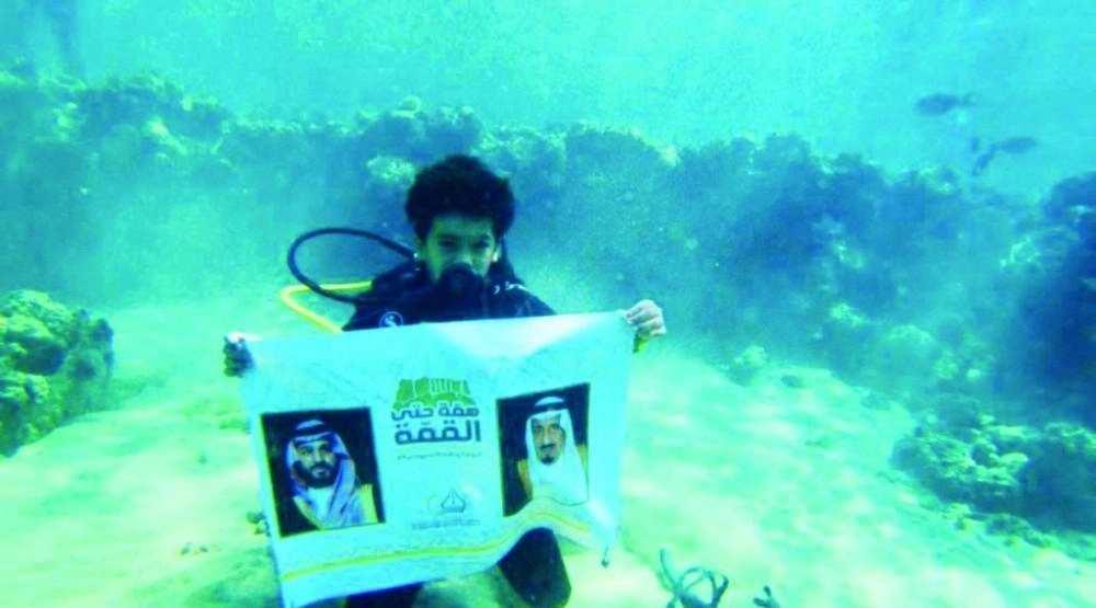 أصغر غواص عربي يرفع صور القيادة في أعماق البحر الأحمر بتبوك  