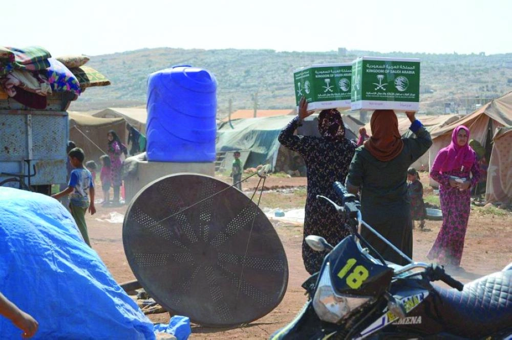 توزيع السلال الغذائية في مخيم البقاع (واس)