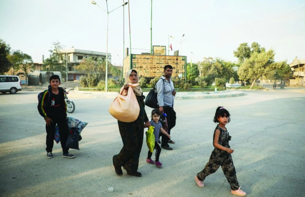 عمليات تهجير واسعة للأكراد ( د ب أ)