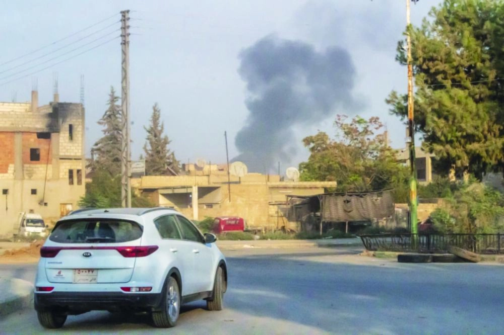 






الدخان يتصاعد شمال سوريا إثر الضربات                                                                               (د ب أ)