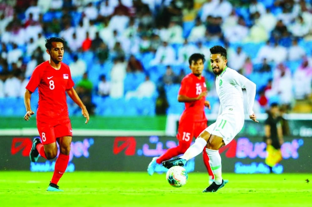 من لقاء السعودية وسنغافورة (اعلامي المنتخب السعودي)
