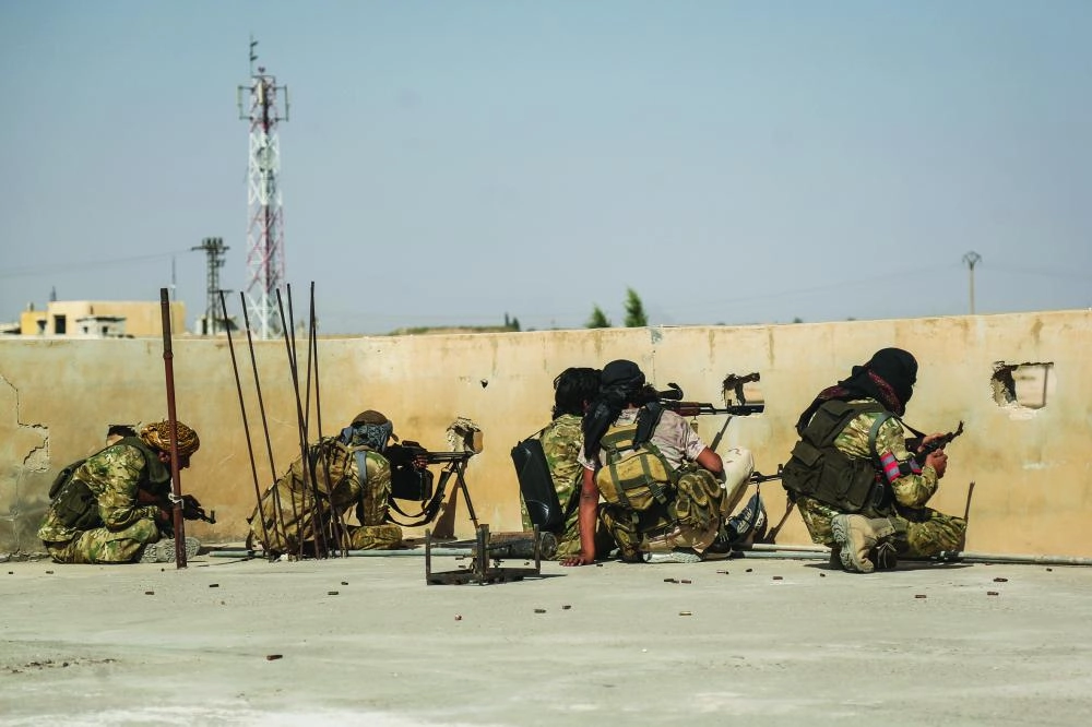 






فصائل تابعة للجيش التركي                                                     (د ب أ)