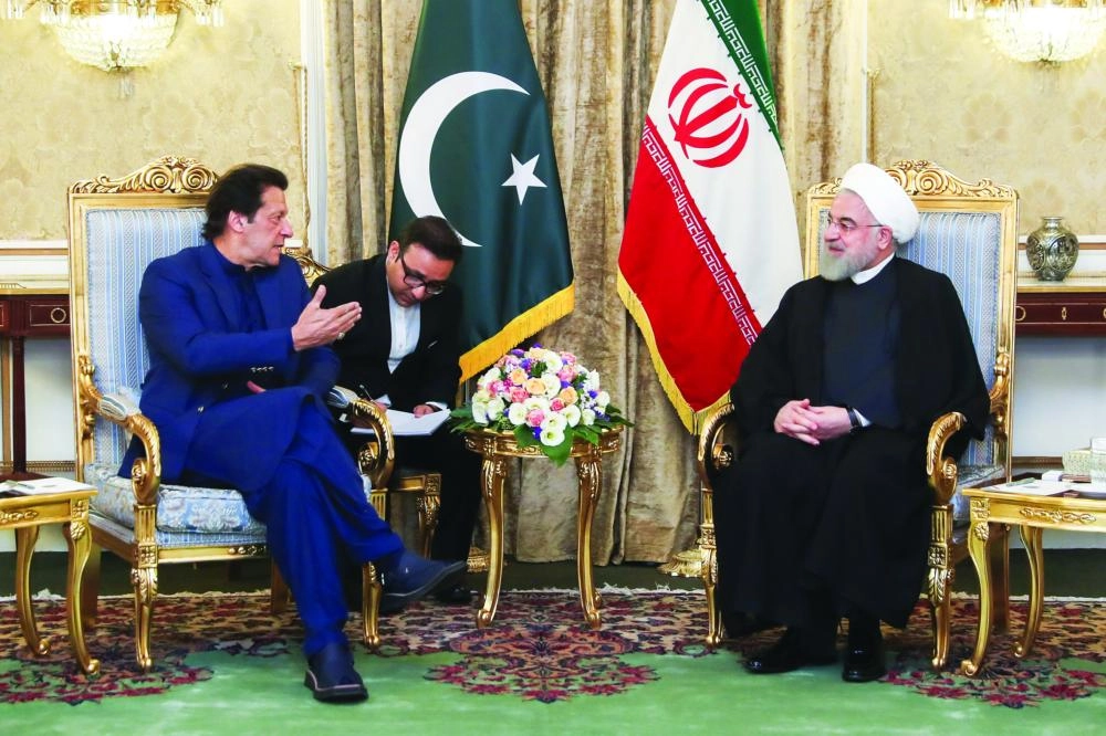 






مباحثات خان مع روحاني                            (د ب أ)