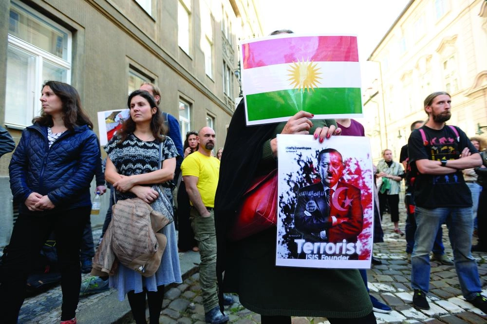 






مظاهرات عالمية ضد التوغل التركي                                                 (د ب أ)