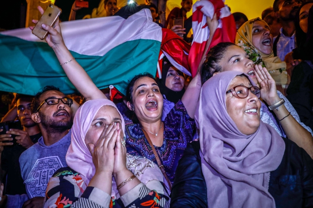 فرحة عارمة عقب فوز قيس سعيد (د ب أ)