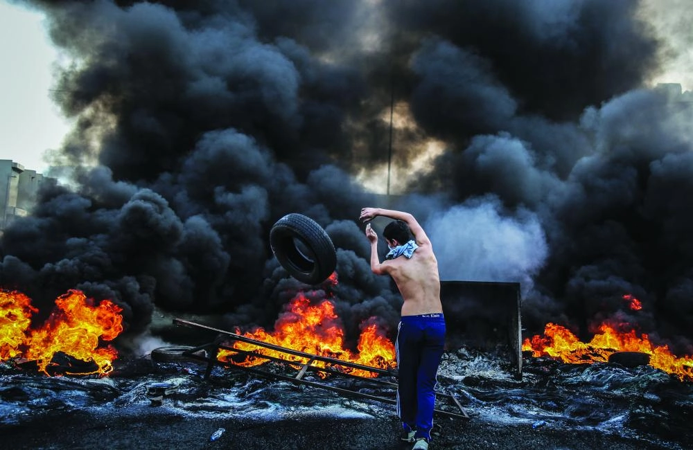 من المظاهرات في لبنان                        (د ب أ)