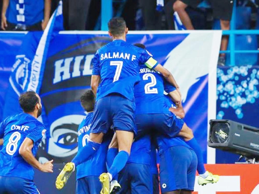 فرحة الفريق الهلالي بإحراز الهدف   (موقع دوري أبطال آسيا)