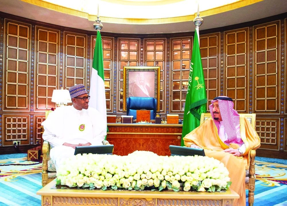 






خادم الحرمين خلال استقباله رئيس نيجيريا                                                                        (واس)