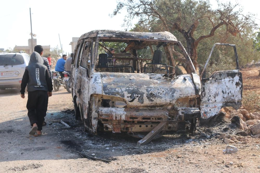 سيارة محترقة بجانب موقع الهجوم على البغدادي               (د ب أ)